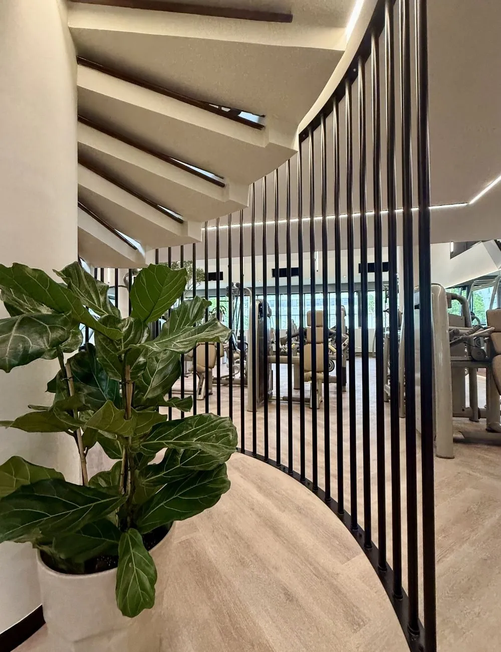 Consultation between two people in a modern WellNest lounge