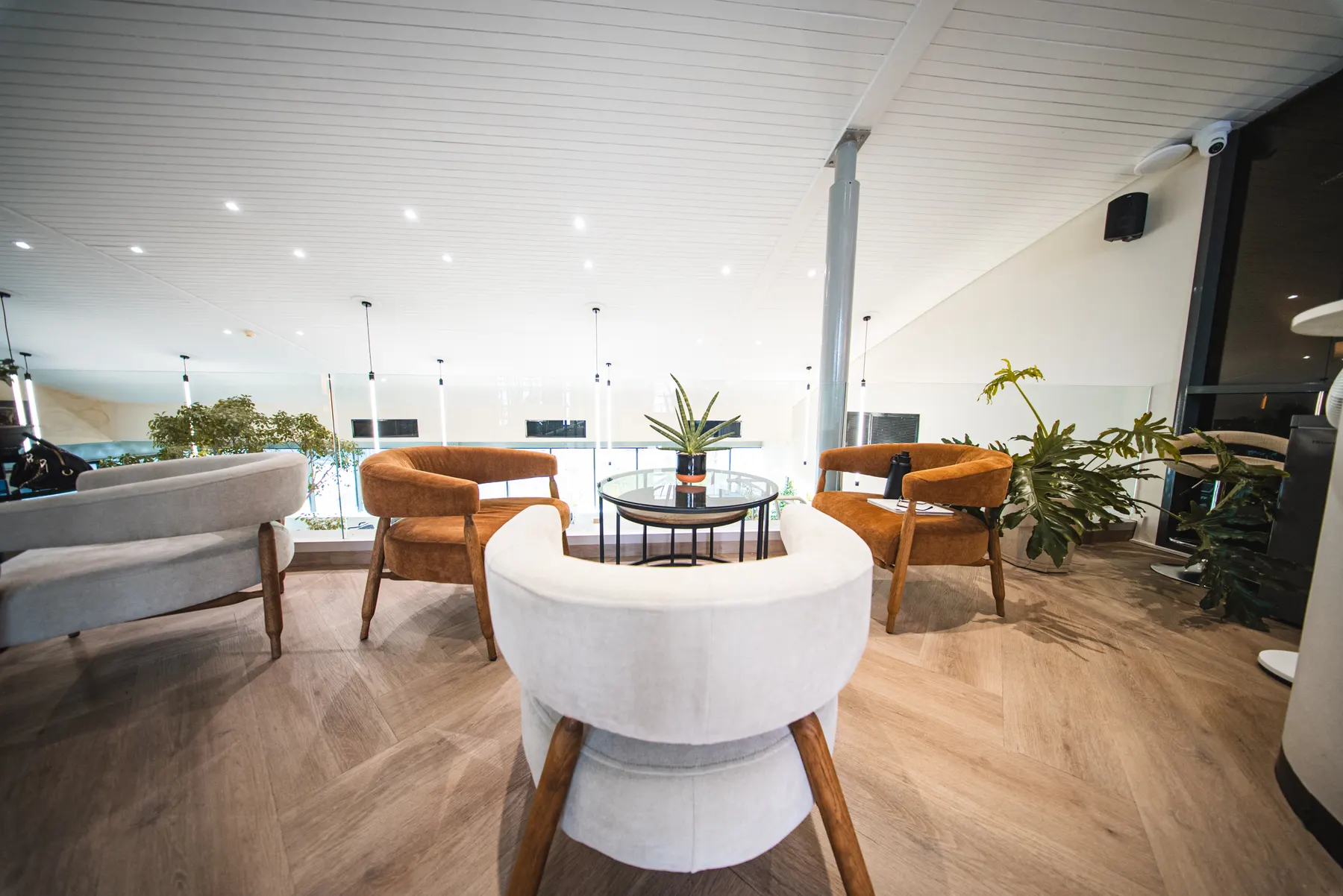 Armchairs in the upstairs lounge at WellNest Gold, 183 Bree Street, Cape Town